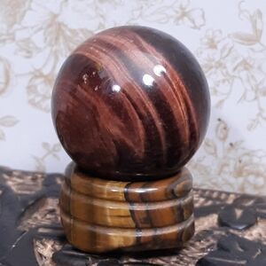 Pair red brown tigers eye crystal ball stone sphere brown stand Scorpio Leo